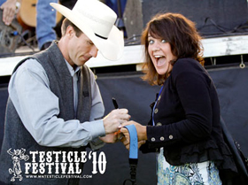 Mallory getting Justin McBride to sign her camera strap!